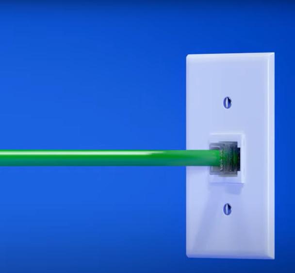 Plug the green cable into the wall outlet